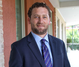 Image of Jason List in a suit and bowtie