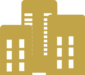 Golden silhouette of three commercial building side by side